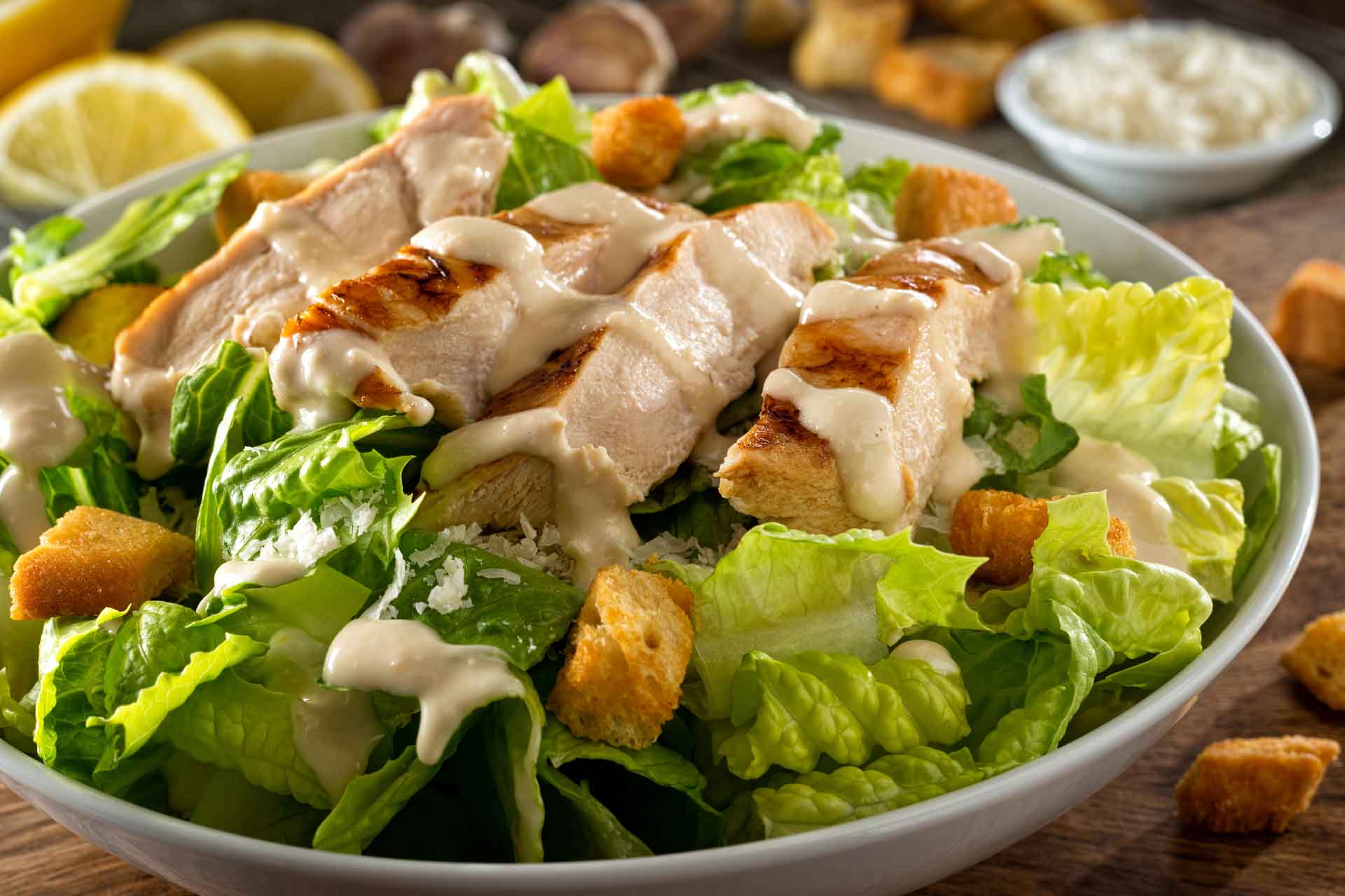Fresh salad topped with grilled chicken